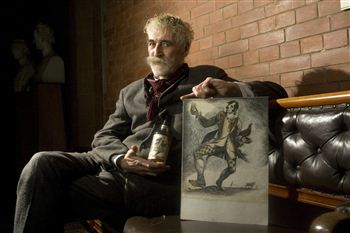 John Byrne and his drawing of Robert Burns which adorns the new Famous Grouse bottles.