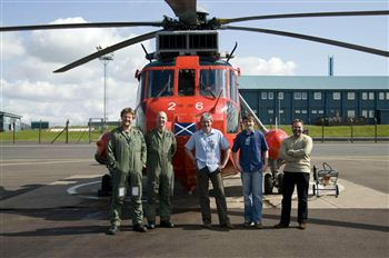 Michael Tunney with son Michael and rescue team