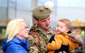 Soldier Says Goodbye to Family at Airport