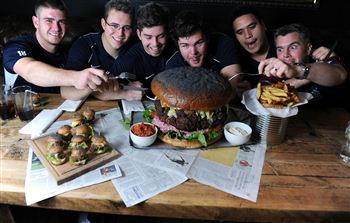 Rugger burger: Team tackle mammoth meal