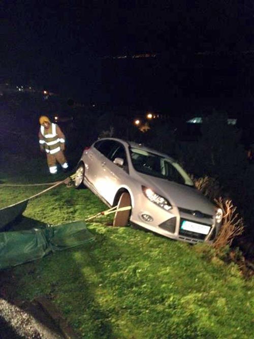 Car passenger rescued in cliff-top drama