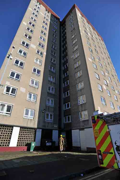 Woman dead after fire tears through flat