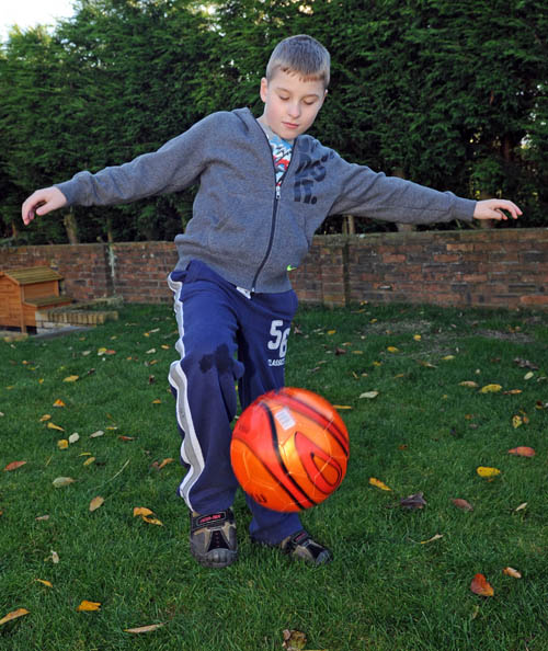 Cerebral palsy boy lives footballing dream
