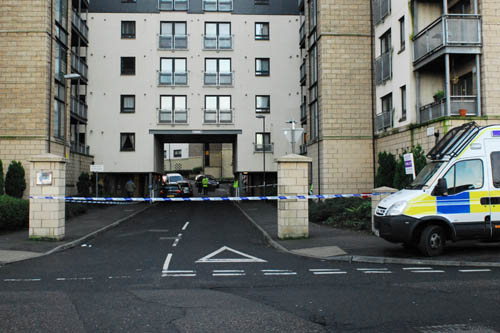Neighbours “fear man was shot” in block of flats