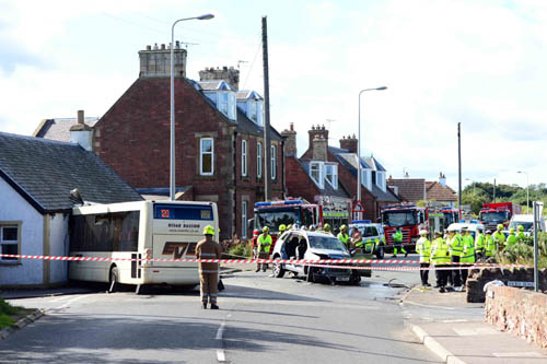The street was sealed off as dozens of emergency workers raced to the scene