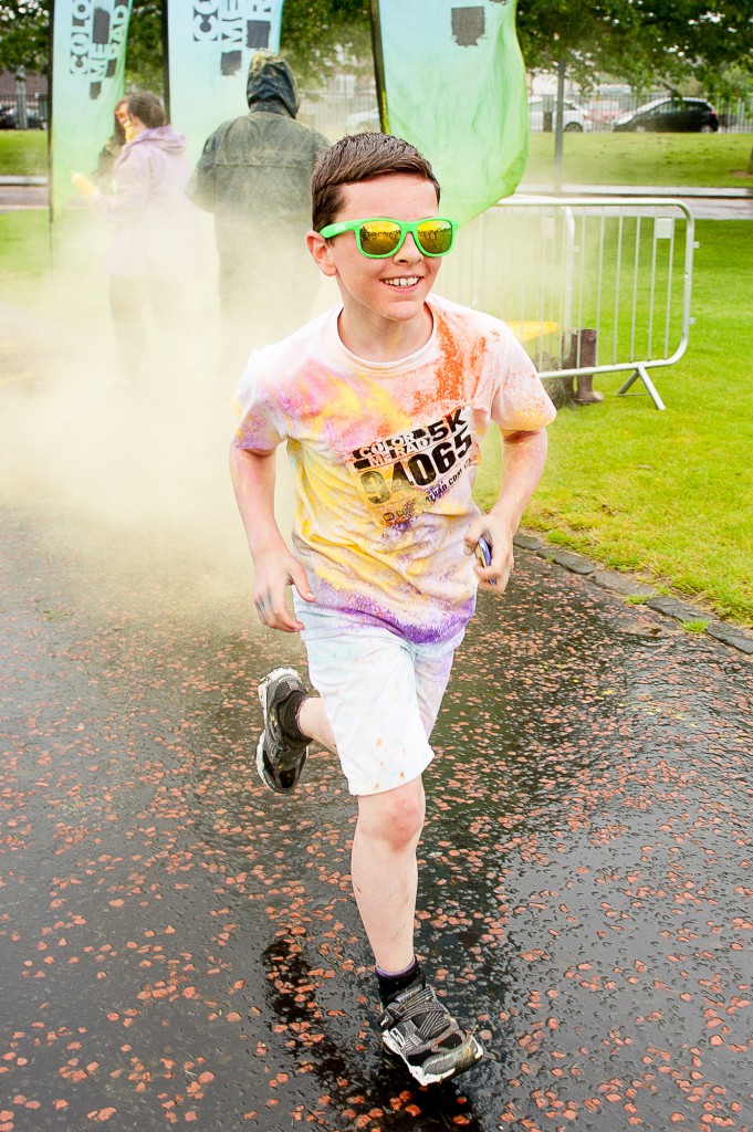 The popular Coulour Me Rad, charity 5K fun run had it's Glasgow leg in Glasgow Green on Sunday, 28th June, 2015. Despite some bad weather, thousands of runners and walkers turned out for a fun day. IN PIC................. Runners of all ages took part. They get hit with a different colour paint at various points on the course. (c) Wullie Marr/DEADLINE NEWS For pic details, contact Wullie Marr........... 07989359845
