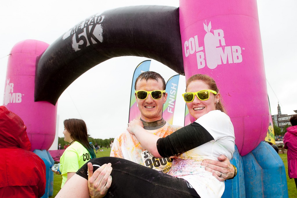 The popular Coulour Me Rad, charity 5K fun run had it's Glasgow leg in Glasgow Green on Sunday, 28th June, 2015. Despite some bad weather, thousands of runners and walkers turned out for a fun day. IN PIC.................  Stephen and Debbie Fleming, both 23, who were married on Friday at Kilbarchan West church, starting their honeymoon with a fun run. The couple met while running with a club in Kilbarchan. (c) Wullie Marr/DEADLINE NEWS For pic details, contact Wullie Marr........... 07989359845