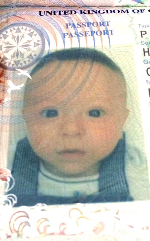 Sir Chris uploaded the snap of his son's first passport photo 