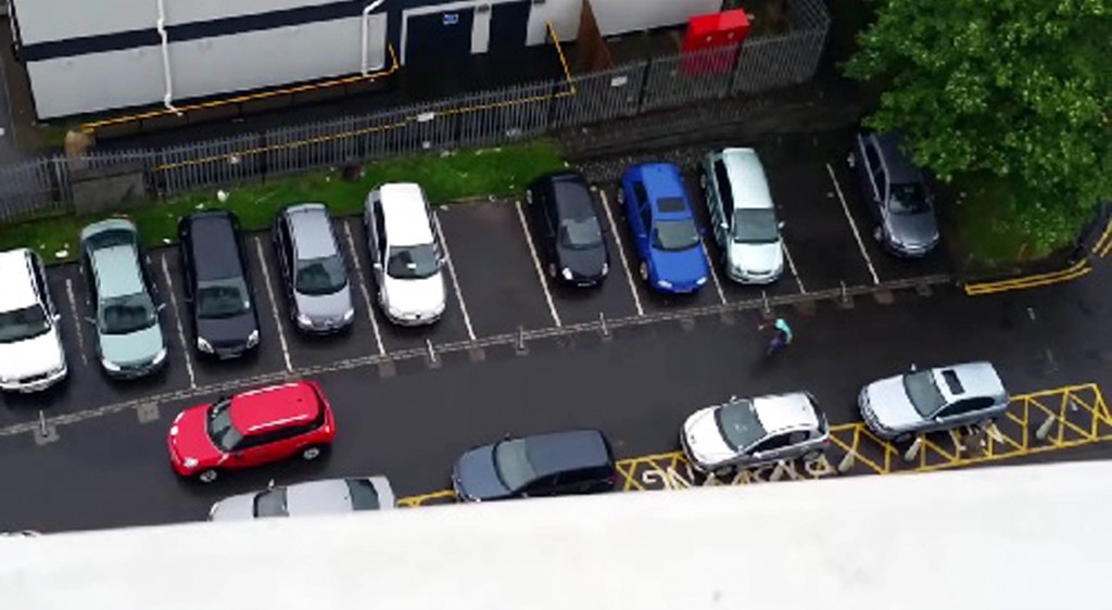 One of the drivers goes off to scout the parking space (Youtube - Glasgow Steph)