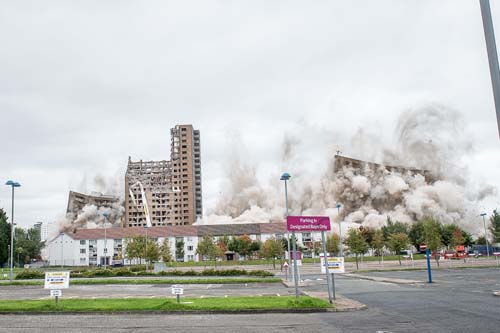 The demolition of the tower blocks at Tarfside Oval in Cardonald, Glasgow, took place on Sunday morning. Three of the four blocks were brought down by controlled explosion, with one block remaining to be mechanically dismantled. IN PIC................. (c) Wullie Marr/DEADLINE NEWS For pic details, contact Wullie Marr........... 07989359845