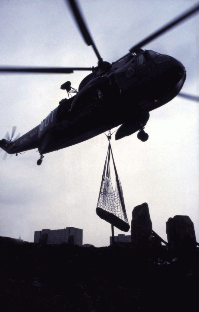 A helicopter lifts the stones into place in '79