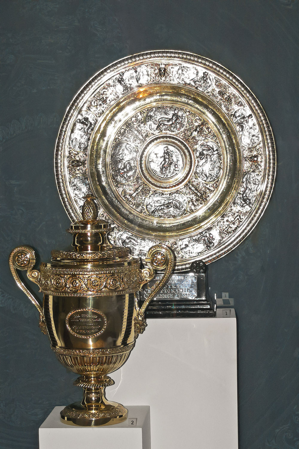 The men's and women's singles trophies