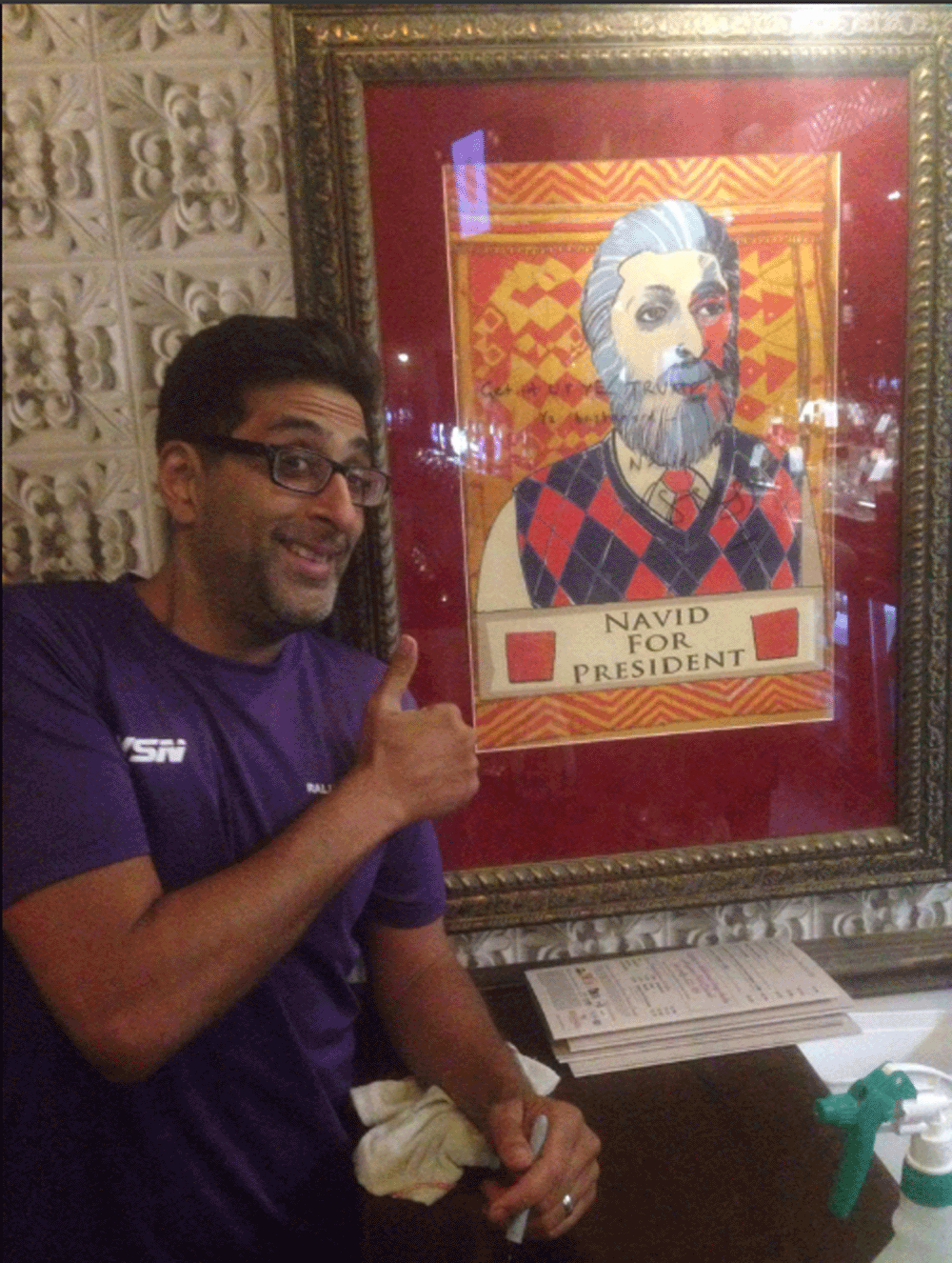Actor Sanjeev Kohli with the portrait of his character, Navid