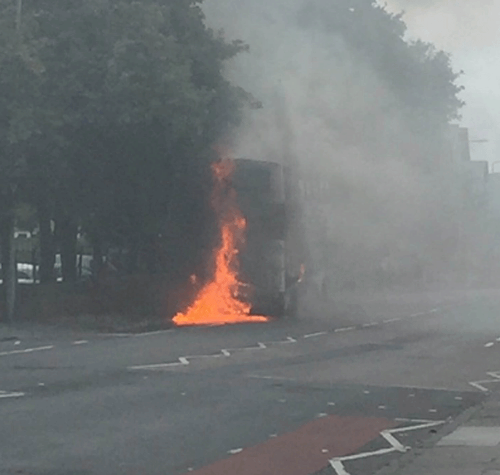 Flames appeared to be coming from the rear of the bus - where the engine is located