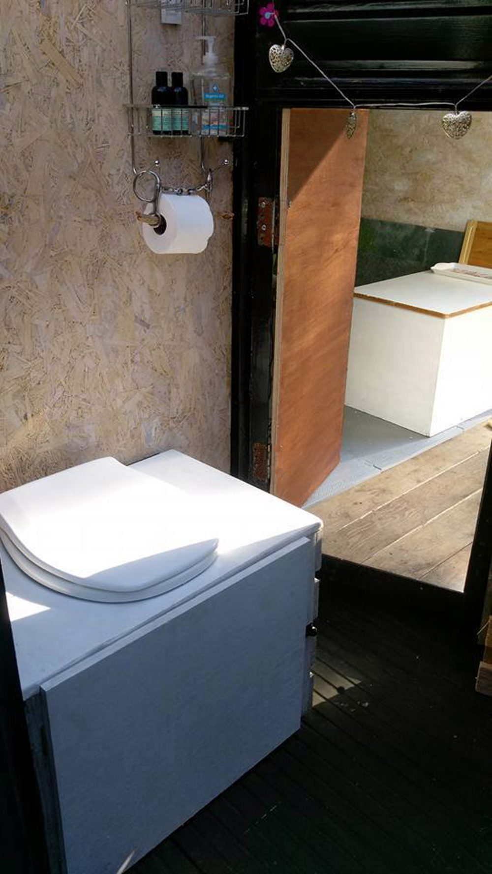 THE UK'S first "glamping horsebox" is for rent on Airbnb for just £30 a night. Constructed using a vintage horsebox, wooden pallets and corrugated iron, the the  home-from-home boasts its own "composting toilet" comeplete with "full instructions". The "Prancing Pony Wild Glamping Pod", in Bonar Bridge, an hour north of Inverness, also has a built in shower and kitchen sink. Guests can also enjoy the "garden" - four acres of stunning Caledonian Pine forest - and little details such as the loo roll holder made from a horse's bit. Owner Stacie MacDonald says on the website "you'll love it if you're more Girl Grylls than high heels" and if you're a guy looking to be a "Wild Man of the Woods". Holidaymakers seeking the "off grid" retreat will have the full experience, according to the description, with drinking water in a portable tank and a shower that is heated using solar panels with a rain capture system. Capable of accommodating two people, with a fold out futon bed, the toilet is accessible from the outside and also through a "tiny" door for inside the trailer.