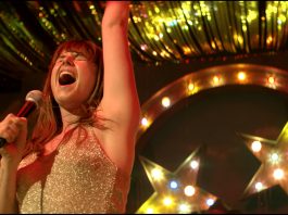 Acrtress Jessie Buckley as the lead character in movie, Wild Rose - review by Jean West for Deadline News