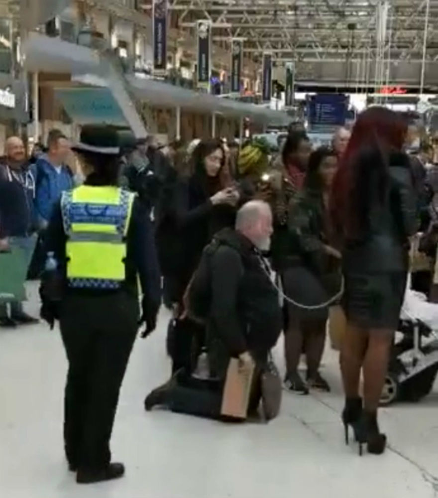 "Whose dad is this?" Moment "fetishist chained to Miss Foxx" confronted by cops at railway station