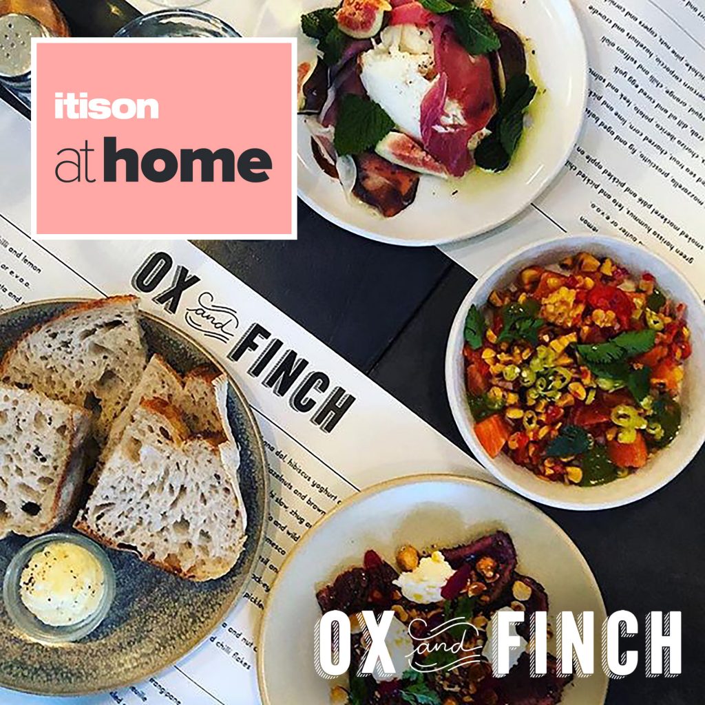 Ox and Finch menu surrounded by meals