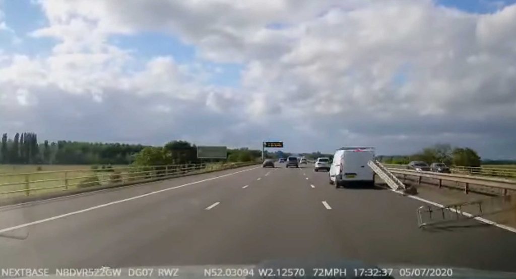 Heart stopping moment ladder flies of the back of a van travelling at 72 mph on motorway