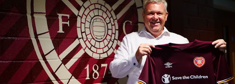 Hearts CEO Andrew McKinlay holds up jersey | Hearts news