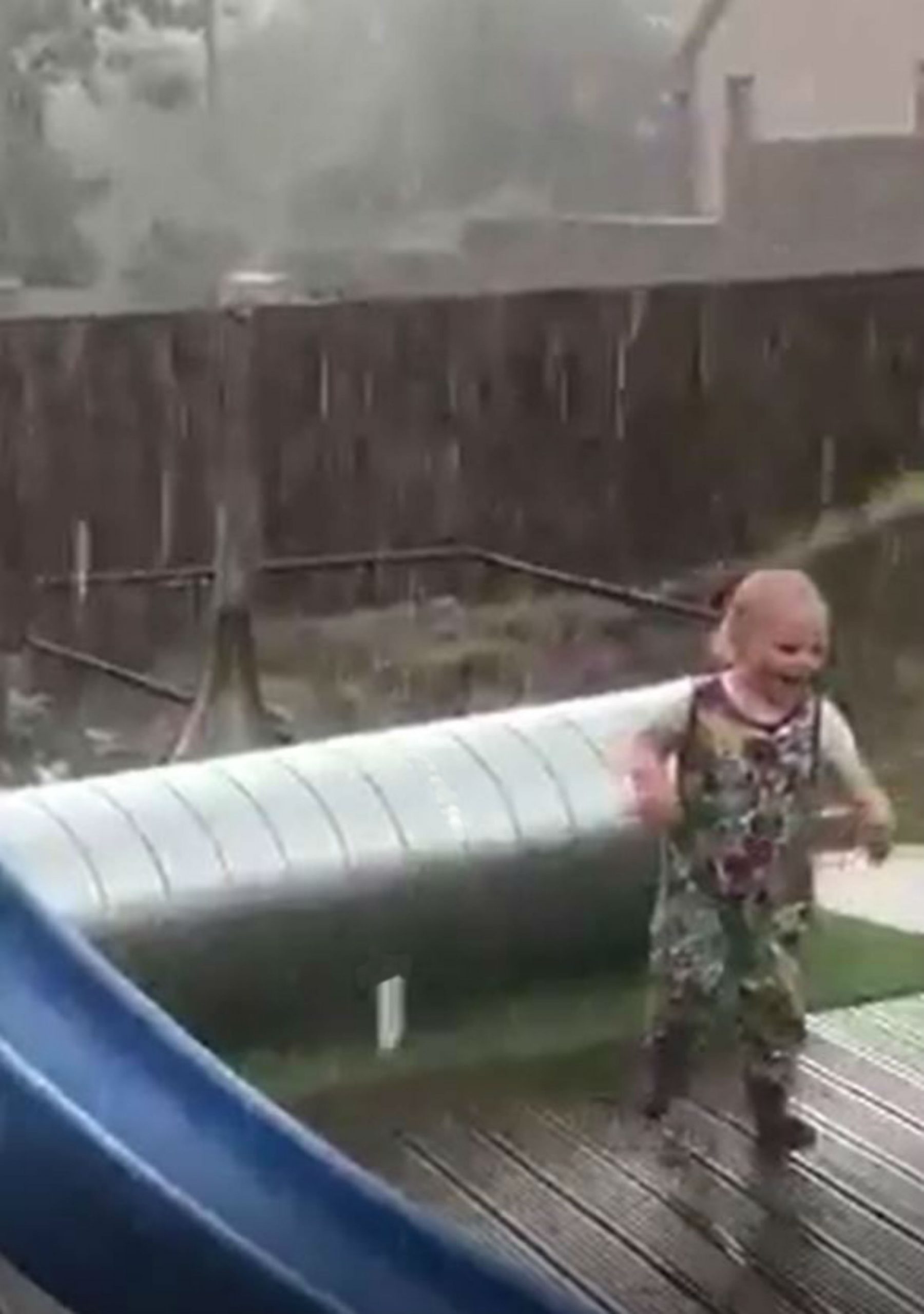 baby dancing in rain