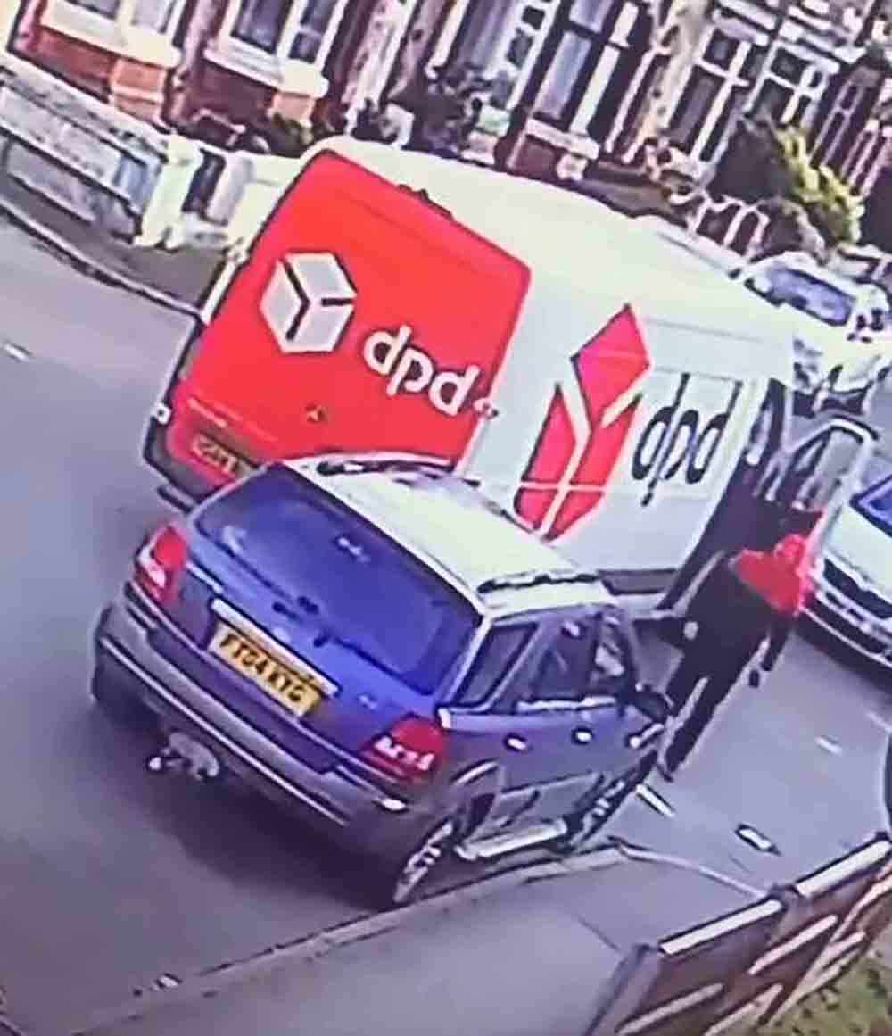 The DPD driver can be seen leaving his van to inspect the damage - Viral Video News