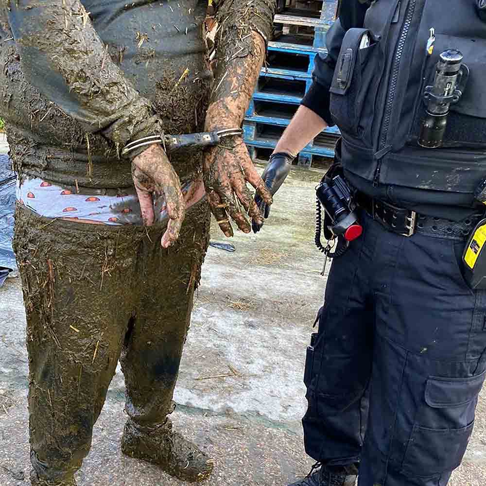 suspect covered in waste