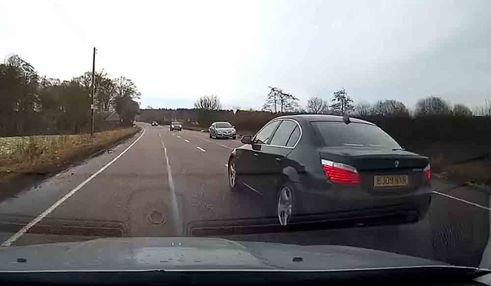 BMW driver narrowly avoids collision with three cars after dodgy overtake - Dashcam Clips