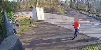 Incompetent amazon driver throws parcel at security gate - Video News UK