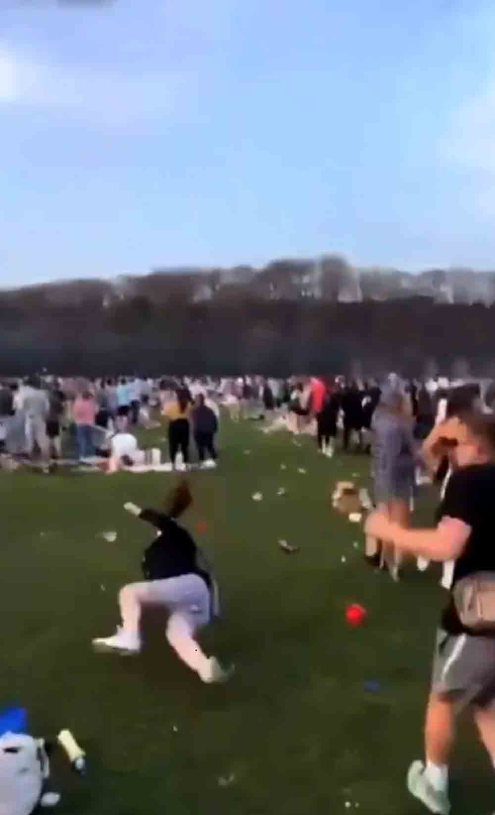Shocking video shows woman fall to the ground after being pelted with football - Viral Video News