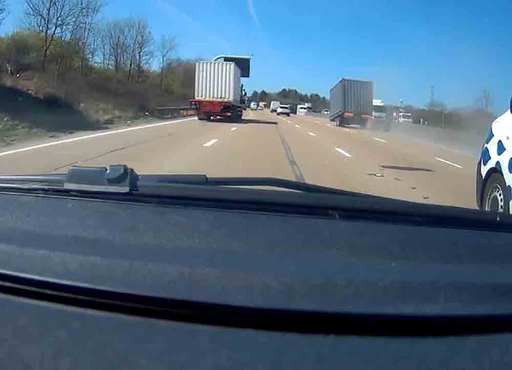 Dash cam captures 20ft container detaching on motorway - Dash Cam UK