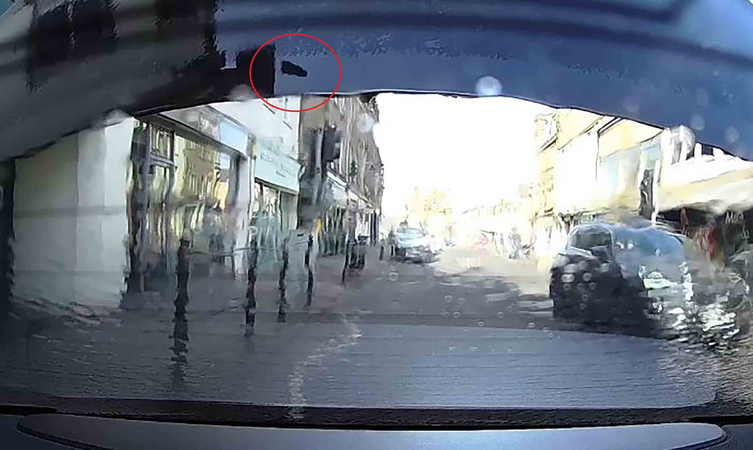 Dash cam footage shows chimney crash through Mercedes rear window - Scottish News