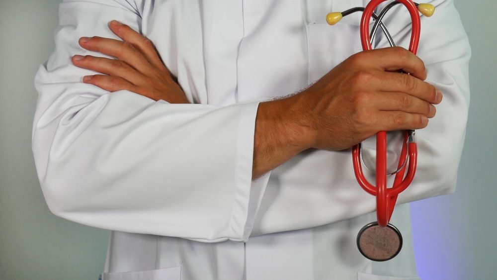 A doctor holding a stethoscope - Health News Scotland