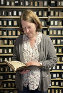 Curator Dr Ulrike Hogg with the manuscript – Scottish News