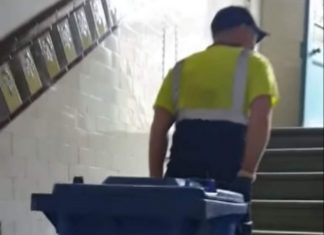 Chris Mitchell dragging bin upstairs - Scottish News