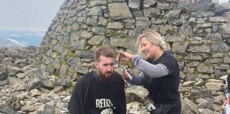Owner Terri cutting hair on top of Ben Nevis | Scottish Nevis