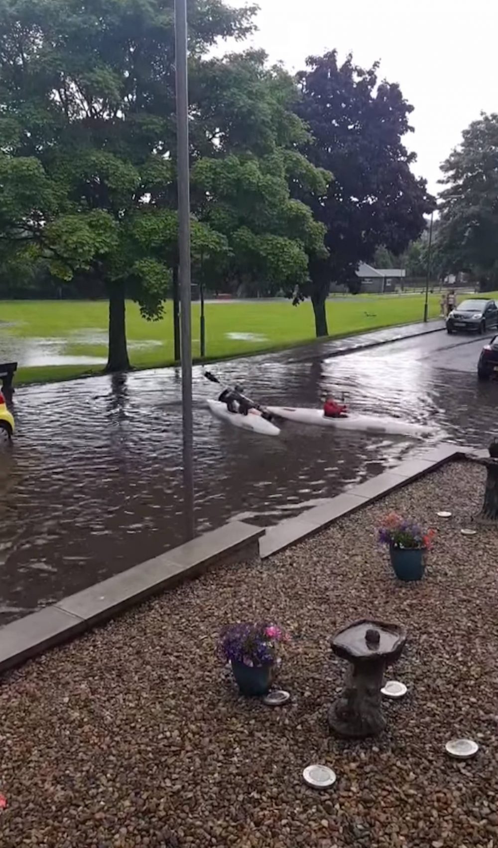 Jardine and Max kayaking in the flooding | Scottish Weather News