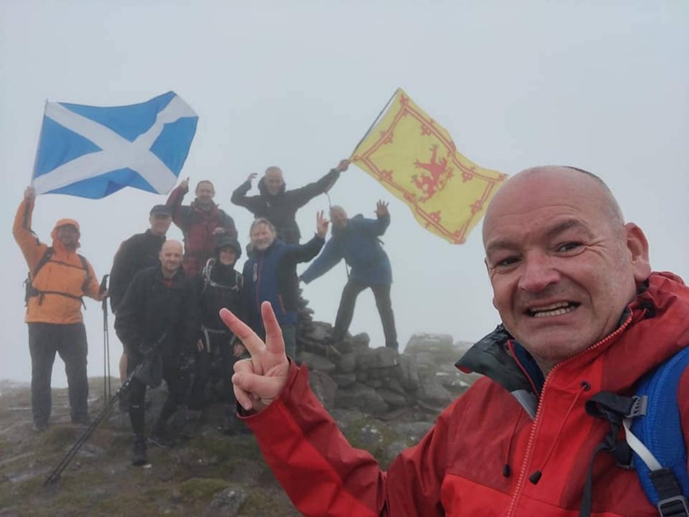 Cam Johnston celebrates his second Munro round | Scottish Hill Walking News