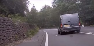 A screenshot from the video of the moment the passenger dropped the cup, resulting in the only charge being a fixed penalty notice for littering.