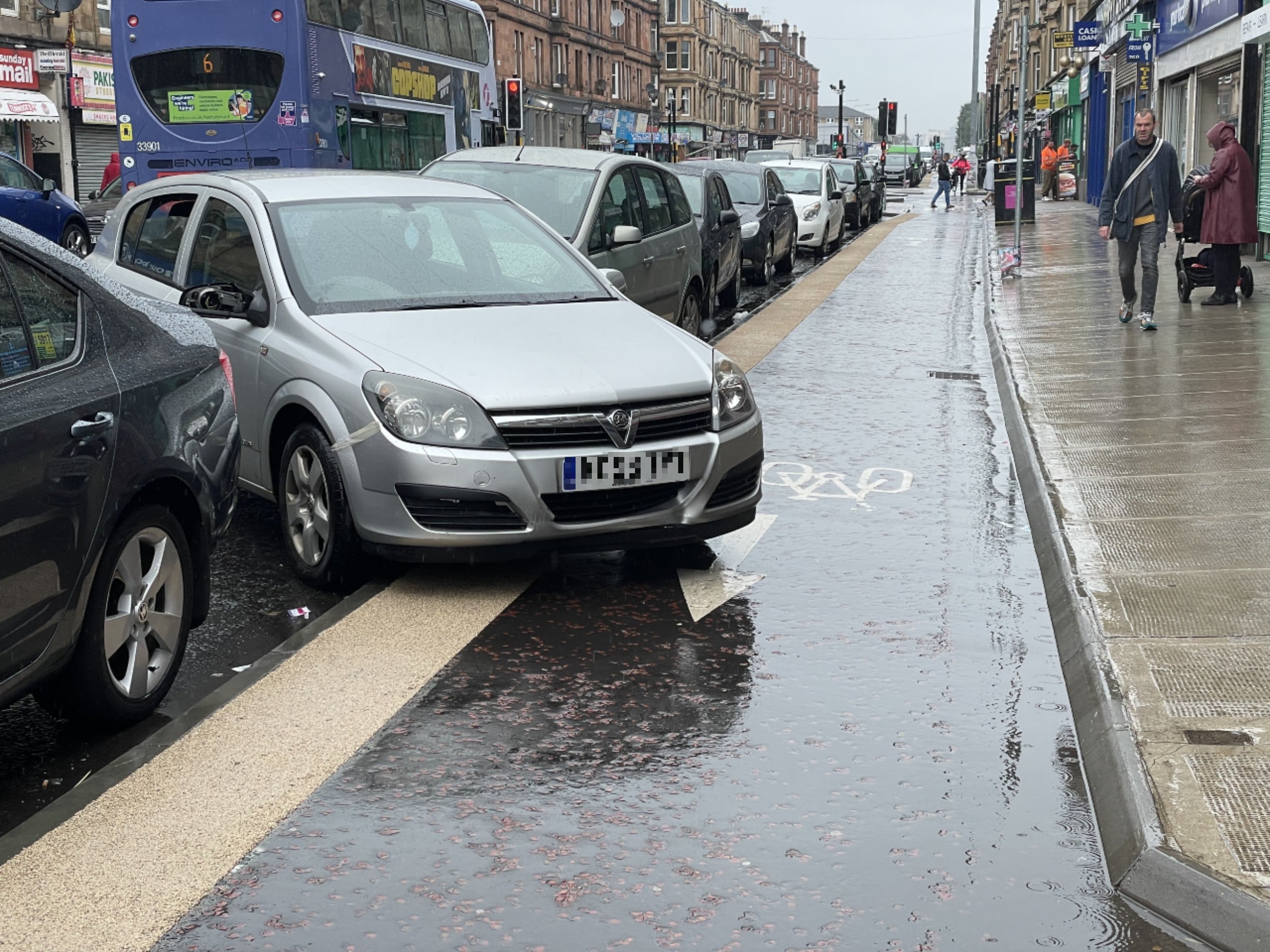 Car parked across cycle lane - Transport News