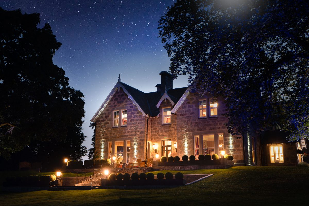 Muckrach House at night
