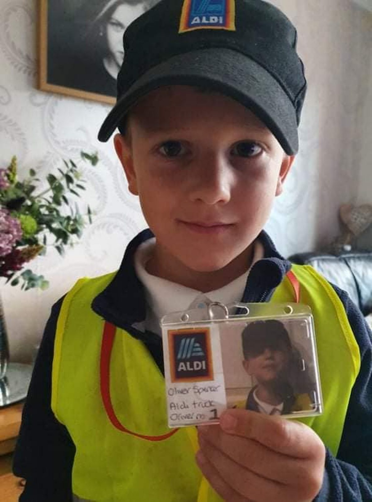 Oliver poses with the lanyard on his Aldi HGV driver costume.