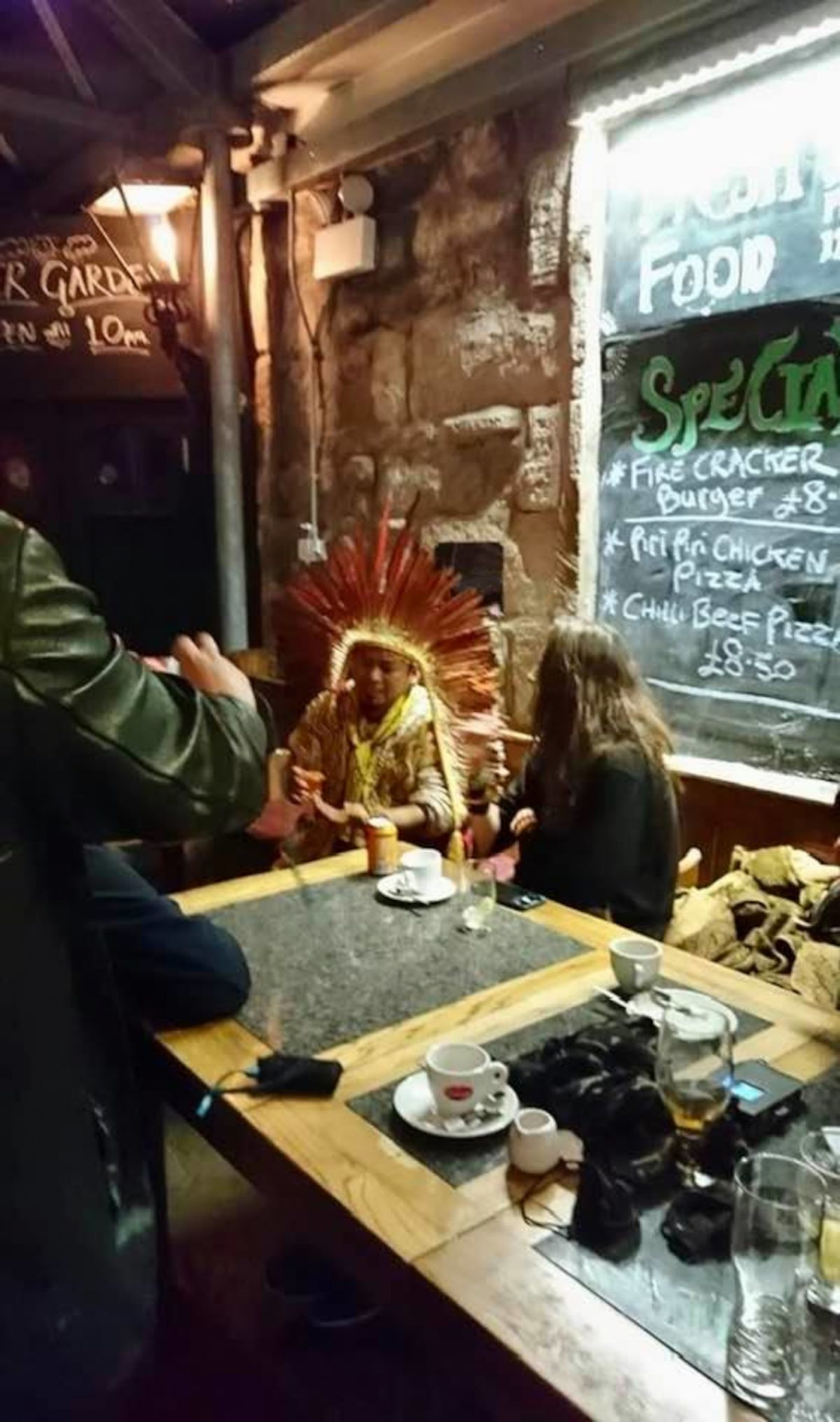 Amazon Chief Ninawa Inu Huni Kuin trying Irn-Bru in a Glasgow pub