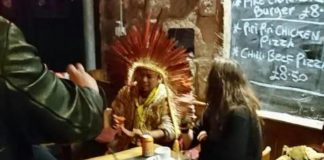 Amazon Chief Ninawa Inu Huni Kuin trying Irn-Bru in a Glasgow pub