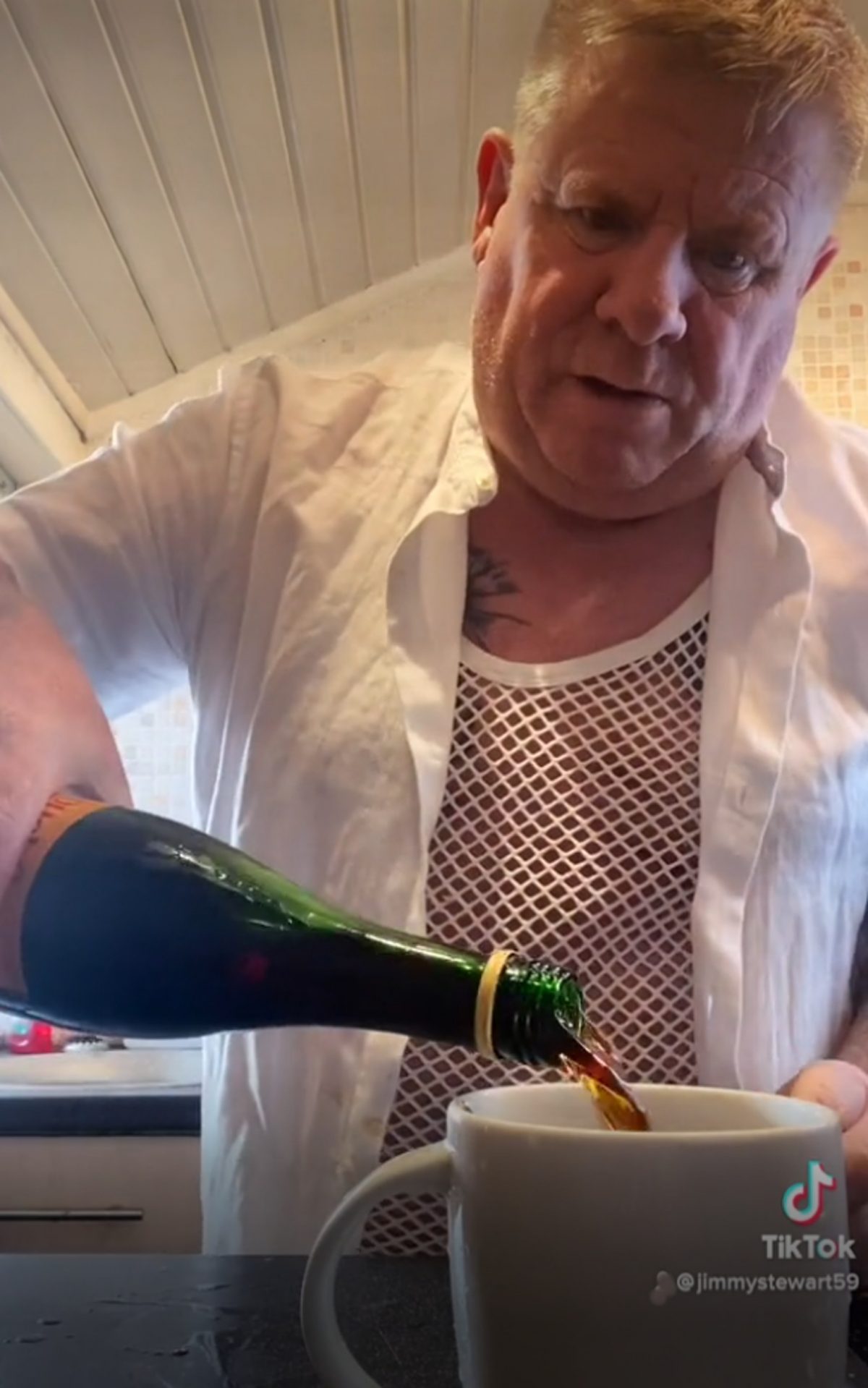 Jimmy pours Buckfast into his drink