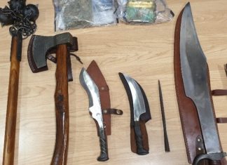 The weapons seized by the officers - including the "wand".