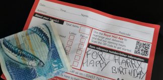 The £5 note and makeshift birthday card from postie Raymond.