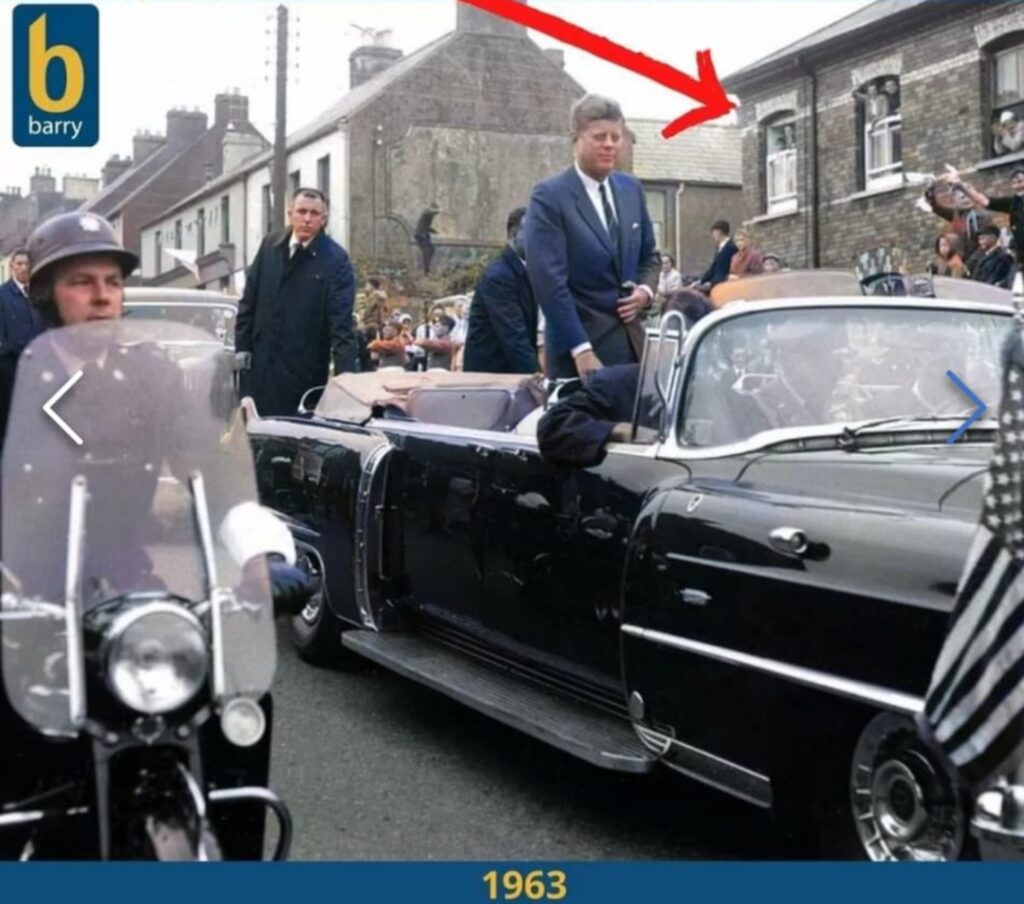 JFK in his motorcade driving down Military Road