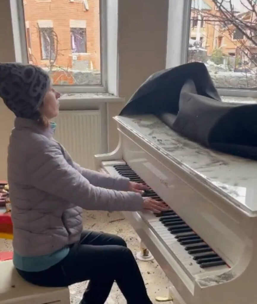 Irina playing her grand piano