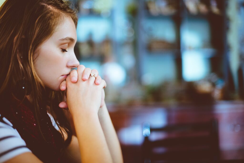 Woman praying.